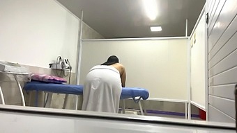 Voluptuous Patient With Big Breasts And Large Rear Receives Oil Massage In Medical Office